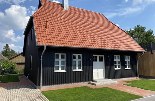 Born auf dem Darss House | FH Magnolia - terrace, roof terrace, garden, sun loungers, barbecue, pets, fireplace, sauna, close to the Bodden, Baltic Sea 6km away, WLAN