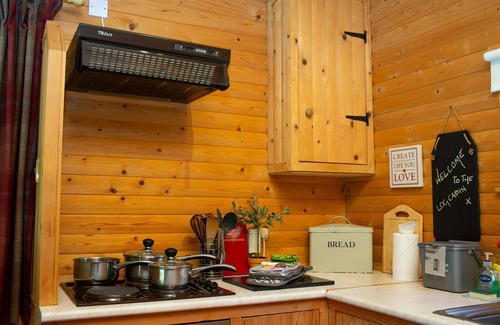 St. Florence Cottage | Fiddlers Green Log Cabin, Tenby