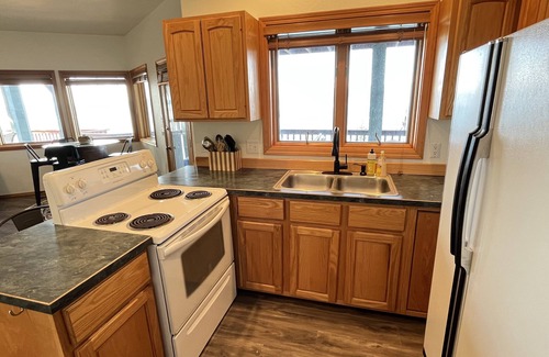 Bigfork House | Fill your soul w/400' of PRIVATE waterfront w/dock, lift, diving board & more!