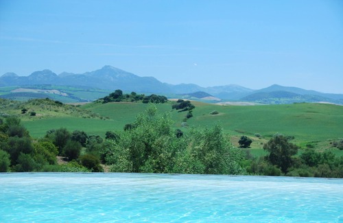 Villamartin Villa | FINCA LAS GATERASn6-BEDROOM VILLA WITH PATIO AND LARGE INFINITY POOL