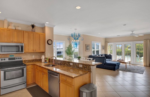 Coral Lagoon House | Finest location in Coral Lagoon. End unit with bay views and boat slip!