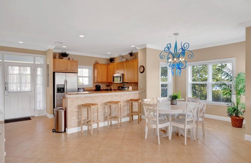 Coral Lagoon House | Finest location in Coral Lagoon. End unit with bay views and boat slip!