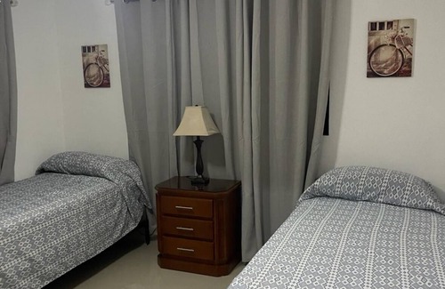 Moca Apartment | First floor 2-bedroom apartment with WiFi, AC in cool Moca