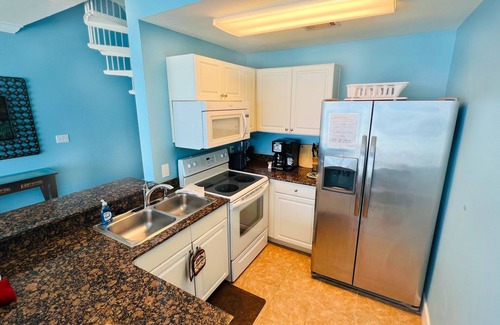 Panama City Beach Condo | FIRST Floor BEACHFRONT Condo near Pier Park. SKIP THE ELEVATORS! Unique 2-story!