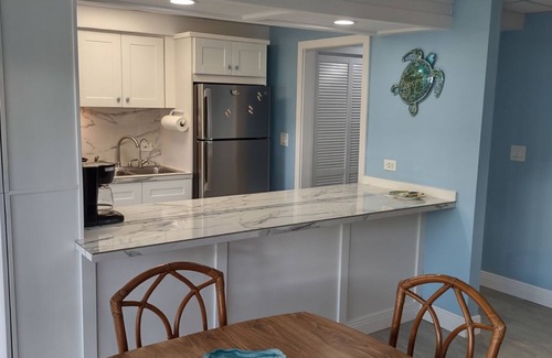 Estate Golden Rock Condo | First Floor. Central A/C. Steps to the beach. Inquire about our monthly rate.