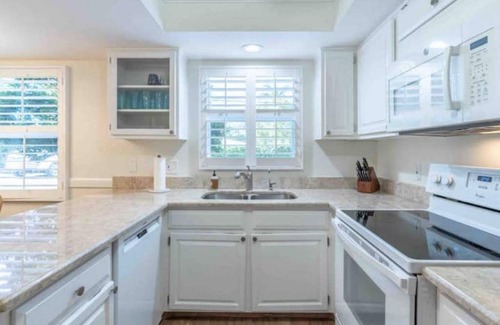 Moorings Apartment | First Floor Condo near Pool and hot tub. 1.2 miles to beach.
