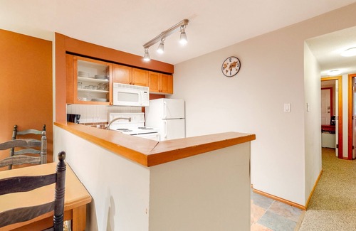Village North Condo | First-floor, side-by-side suites with pool, hot tub & gym - walk to lifts