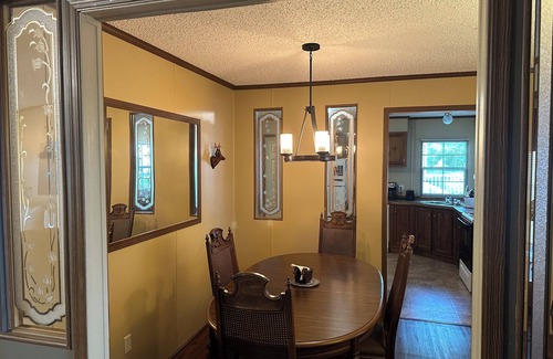 Hornbeak House | Fish cleaning station, screened porch, covered front porch, fire pit, 3 BR