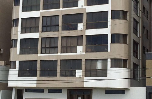 Capao da Canoa Apartment | Fit. facing the sea, 2 bedrooms with 1 suite, barbecue and garage