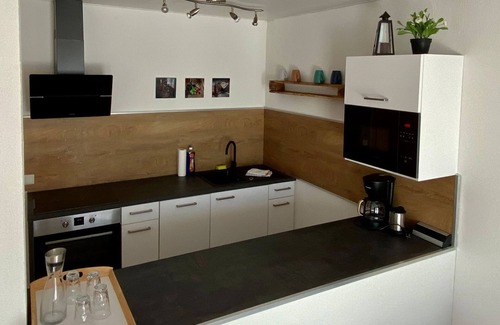 Ungstein Apartment | Fitter apartment, street side, 2 floors (EG,DG) - Apartments Dehn