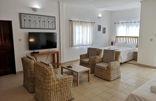 Kololi Hotel | Flame Tree