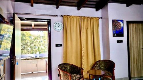 Mallital House | Flamingo Cottage