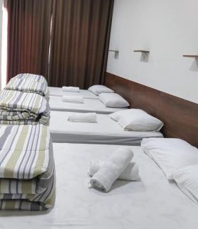 Aparecida House | Flat familiar com ar,wi fi,cozinha e garagem