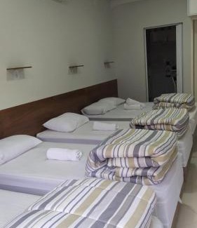 Aparecida House | Flat familiar com ar,wi fi,cozinha e garagem
