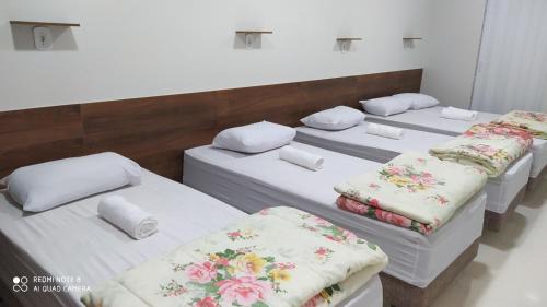 Aparecida House | Flat familiar com ar,wi fi,cozinha e garagem