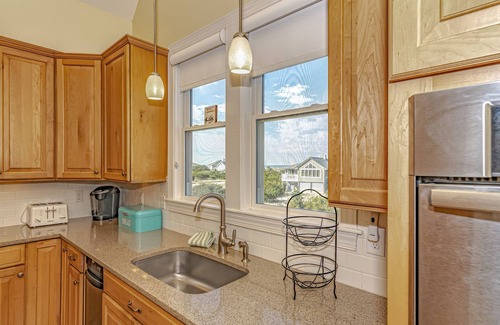 South Beach House | Flip Flops overlooks the signature hole of the golf course and has a beautiful view of the ocean!