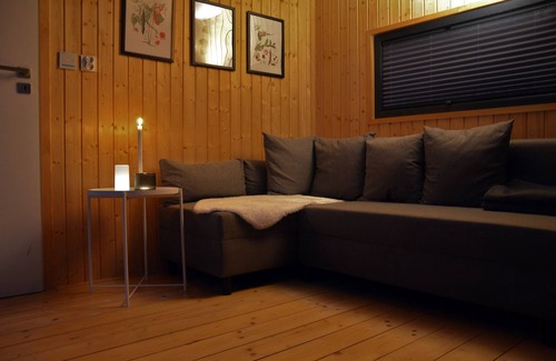 Blankaholm Boat Rental | Floating house, unobstructed view of the beautiful water with boat, Blankaholm Sweden