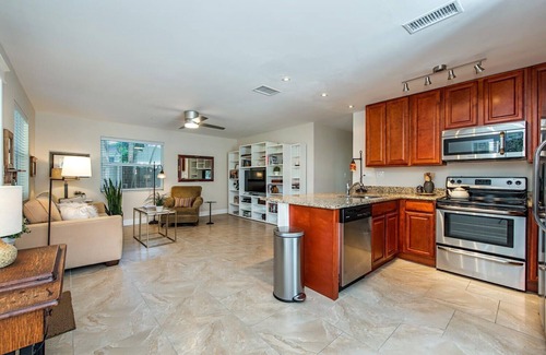 Central Naples House | Florida bungalow with loads of charm in tropical and private setting.