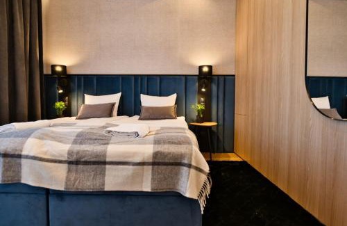 Zator Apartment | Flower Blue 2 by Housine