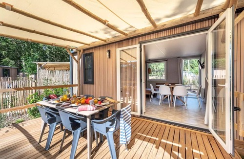 Saint-Hilaire-de-Riez House | Flower Camping Les Biches * - Mobil-home Garden 3hc- PREMIUM - 33m2- terrace cover -TV - LV - plancha - bathtub - FREE WIFI 6 people