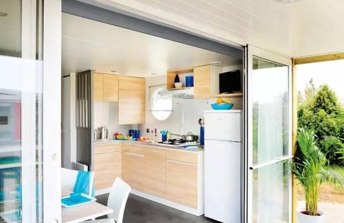 Montgeard House | Flower Camping Du Lac De Thésauque * - Mobile home Comfort 33m2 2 bedrooms + Air conditioning + TV + LV + covered terrace 4 people