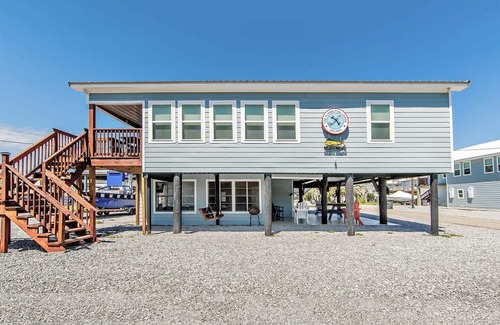 Grand Isle House | Flying Fish Lodge Mahi - Beach Access - Island Realty