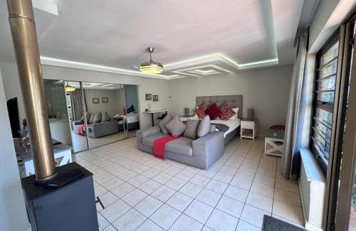 Lanseria House | Footprints Self Catering Indoor Heated Pool and Fireplaces