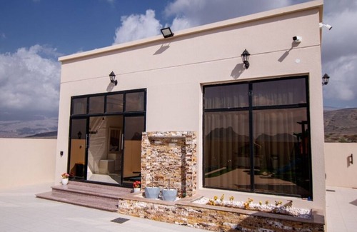 Al Hamra Ski Chalet | For those looking for family privacy and tranquility away from noise of city. .