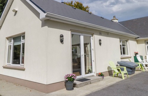 Milltown Cottage | FOREST HOUSE, romantic, with open fire in Tuam, County Galway