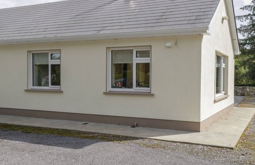 Milltown Cottage | FOREST HOUSE, romantic, with open fire in Tuam, County Galway