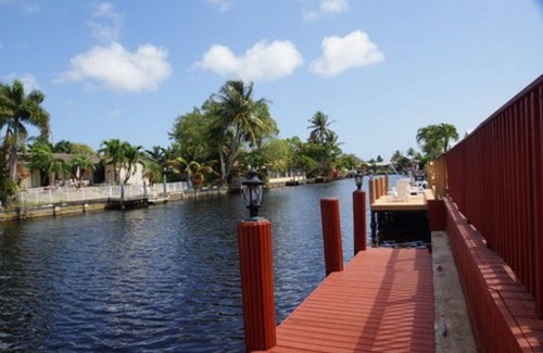 Coral Ridge Isles House | Fort Lauderdale 4/2 with screened-in pool and dock.