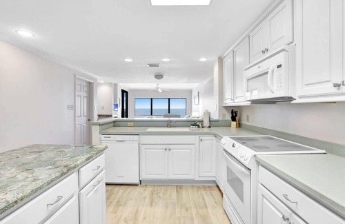 Orange Beach Condo | Four Seasons 402-E, Private fishing pier
