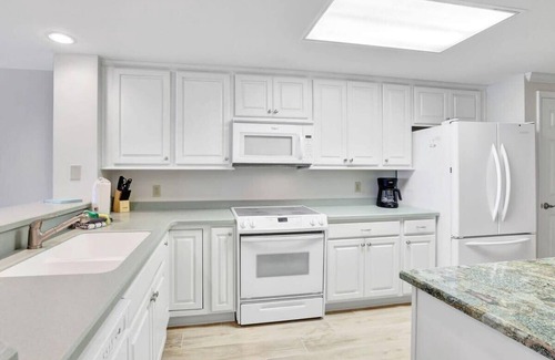 Orange Beach Condo | Four Seasons 402-E, Private fishing pier
