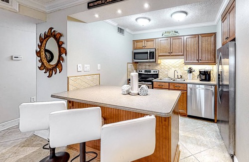 Holiday Isle Condo | Fourth Floor Oceanfront Condo with Shared Pool, Ocean View, WiFi, W/D, and AC