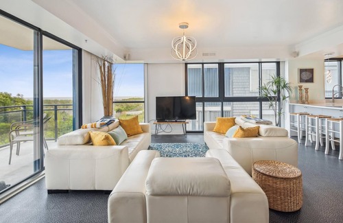 Midtown Ocean City House | FREE ACTIVITIES AND LINENS! Fantastic 4BR, 4.5BA modern oceanfront townhouse with ground level access to the beach access! Secure elevator access to your private condo lobby!