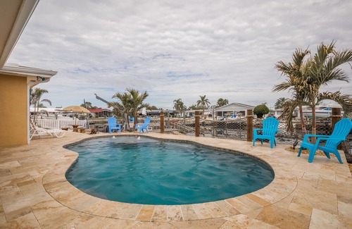 Gulf Harbors House | Free use of pontoon boat for your stay. Paradise on the water with heated pool