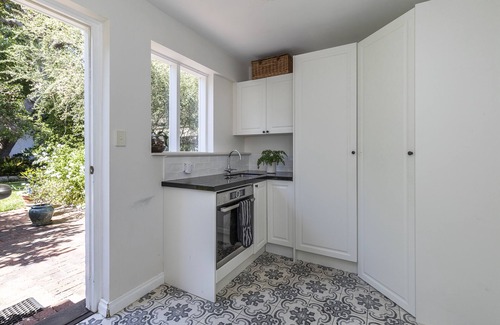Claremont House | French Charm on Leafy Street near River.