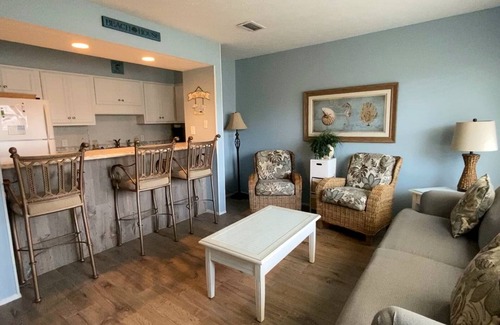Thomas Drive Condo | Freshly updated beachfront condo with stunning views. Sleeps 4. Onsite Pool.