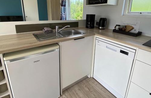 De Veenhoop Ski Chalet | Friesland Chalet near the watershore, cleaning included