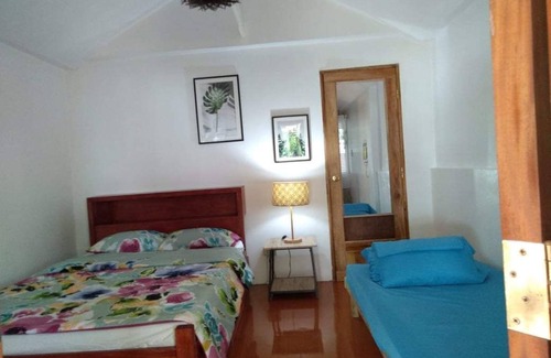 Carles Resort | Front Beach Cottages Rental Breakfast included