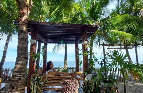 Carles Resort | Front Beach Cottages Rental Breakfast included