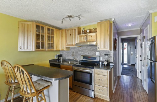 Isle of Palms Condo | Front beach sea cabin with amazing view, pool access, beach access, and pier!
