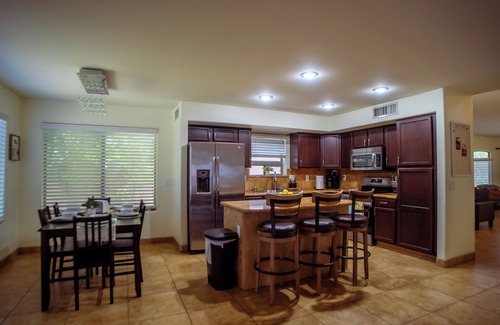 Fireside at Norterra House | Full family friendly house w/private heated pool and pizza oven!