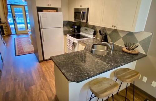 Canmore House | Full Mountain Chalet facing HEATED POOL and HOT TUB!