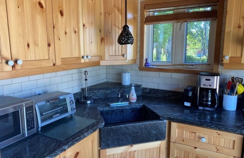 Notre-Dame-du-Portage Ski Chalet | Fully-equipped chalet with views and access to the river, sun, relaxation and the great outdoors