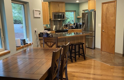 Burley House | Fully equipped house nestled in old growth trees with miles of beaches/trails
