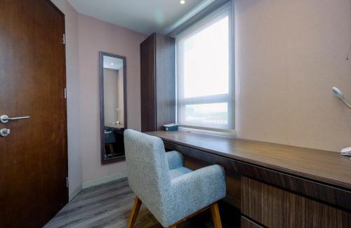 Cikarang Apartment | Fully Furnished and Comfortable 1BR Apartment Mustika Golf Residence By Travelio
