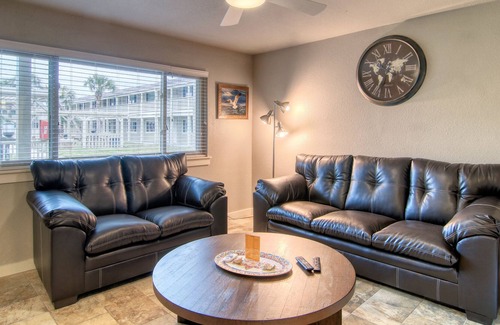 Port Aransas Condo | Fully remodeled condos! Large pool! Only a block to the beach!