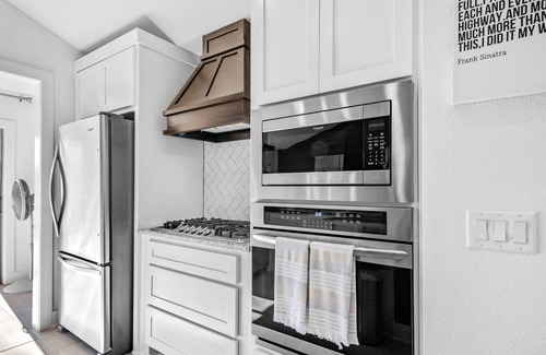 Downtown House | Fully remodeled downtown home with enclosed yard, fireplace, game room & deck