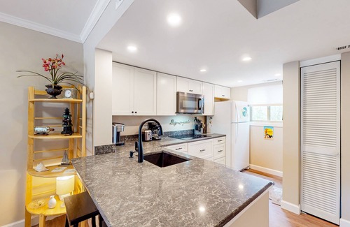 Hilton Head Island Condo | Fun & bright beach getaway with pool, easy beach access & pond view